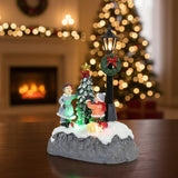 Aneta &amp; Filip | Christmas light decoration next to the Christmas tree